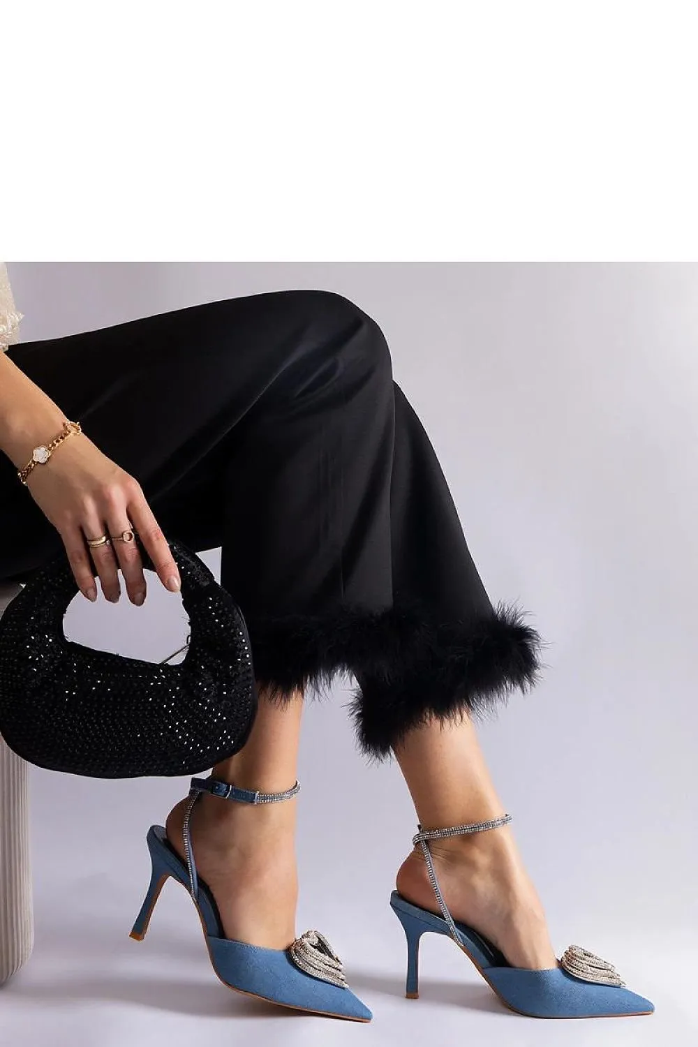 Black high heels with an open heel
