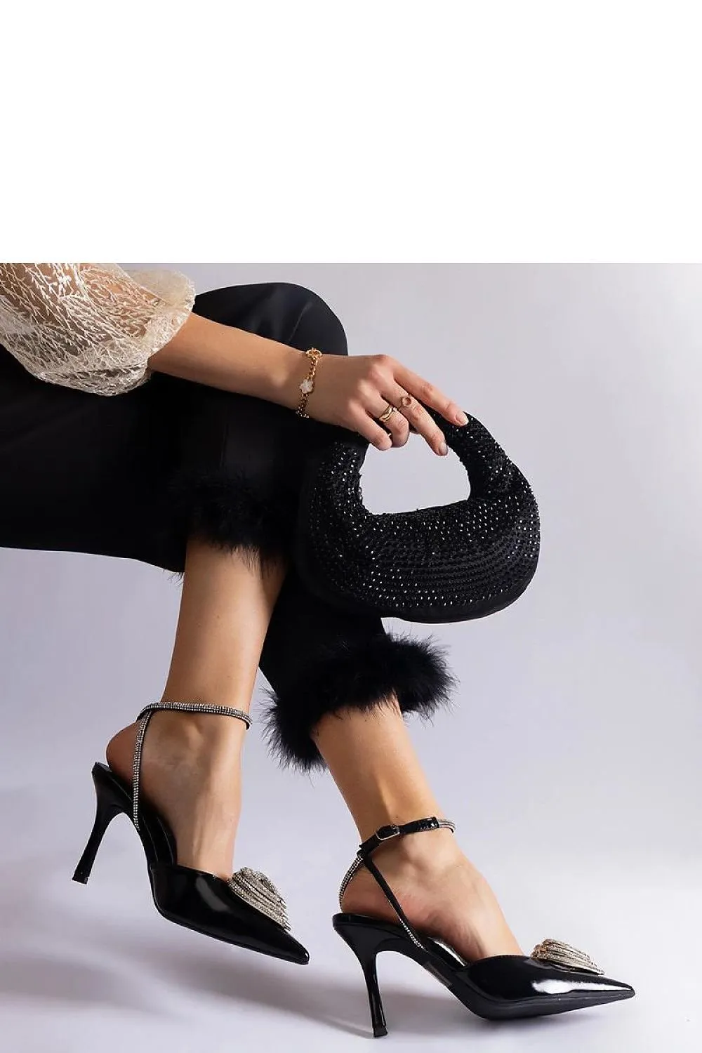 Black high heels with an open heel
