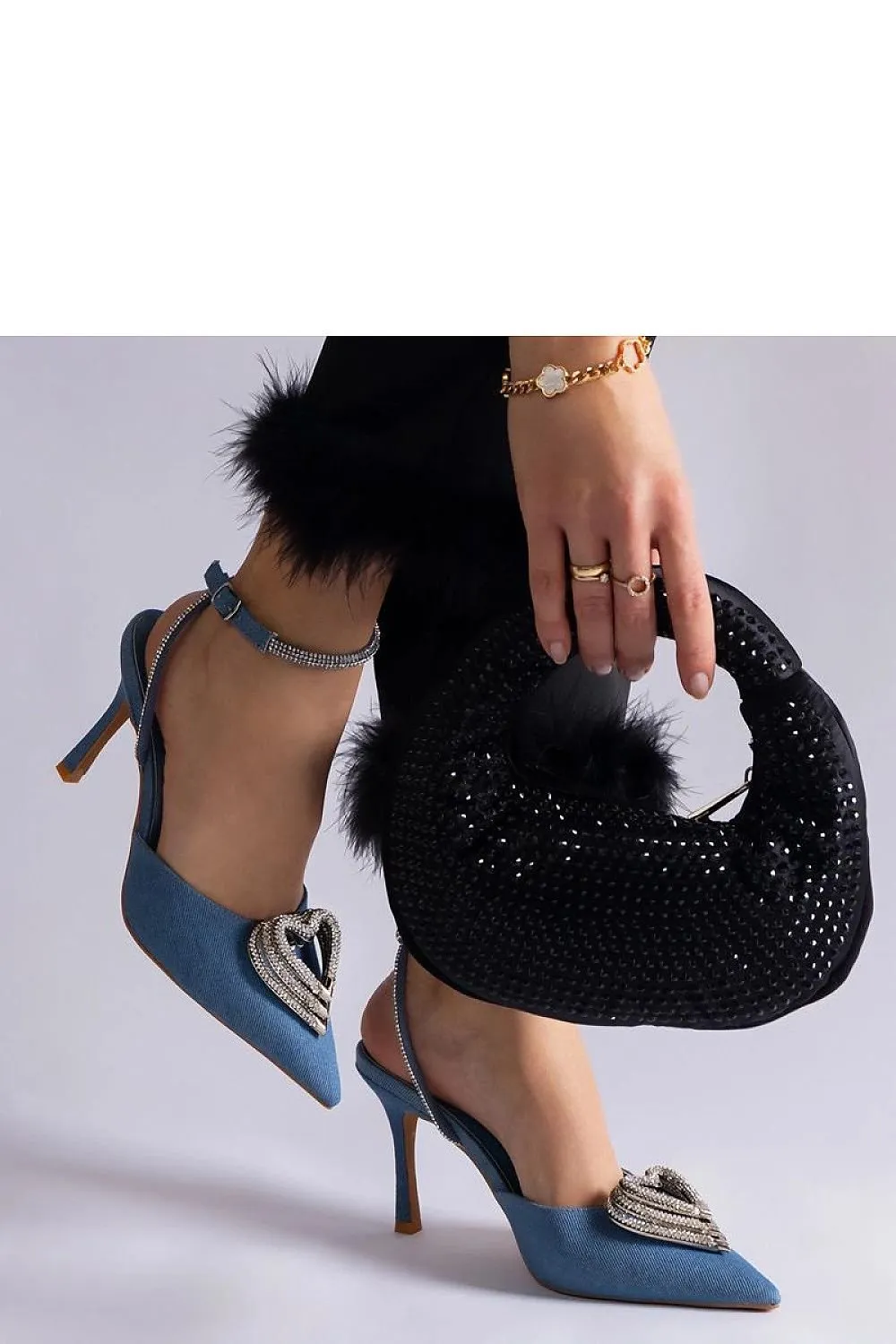 Black high heels with an open heel