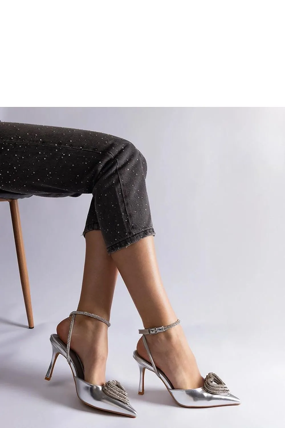 Black high heels with an open heel