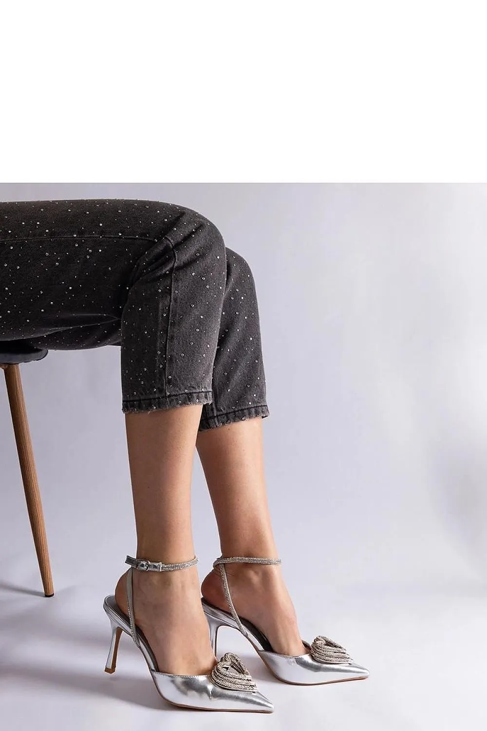 Black high heels with an open heel