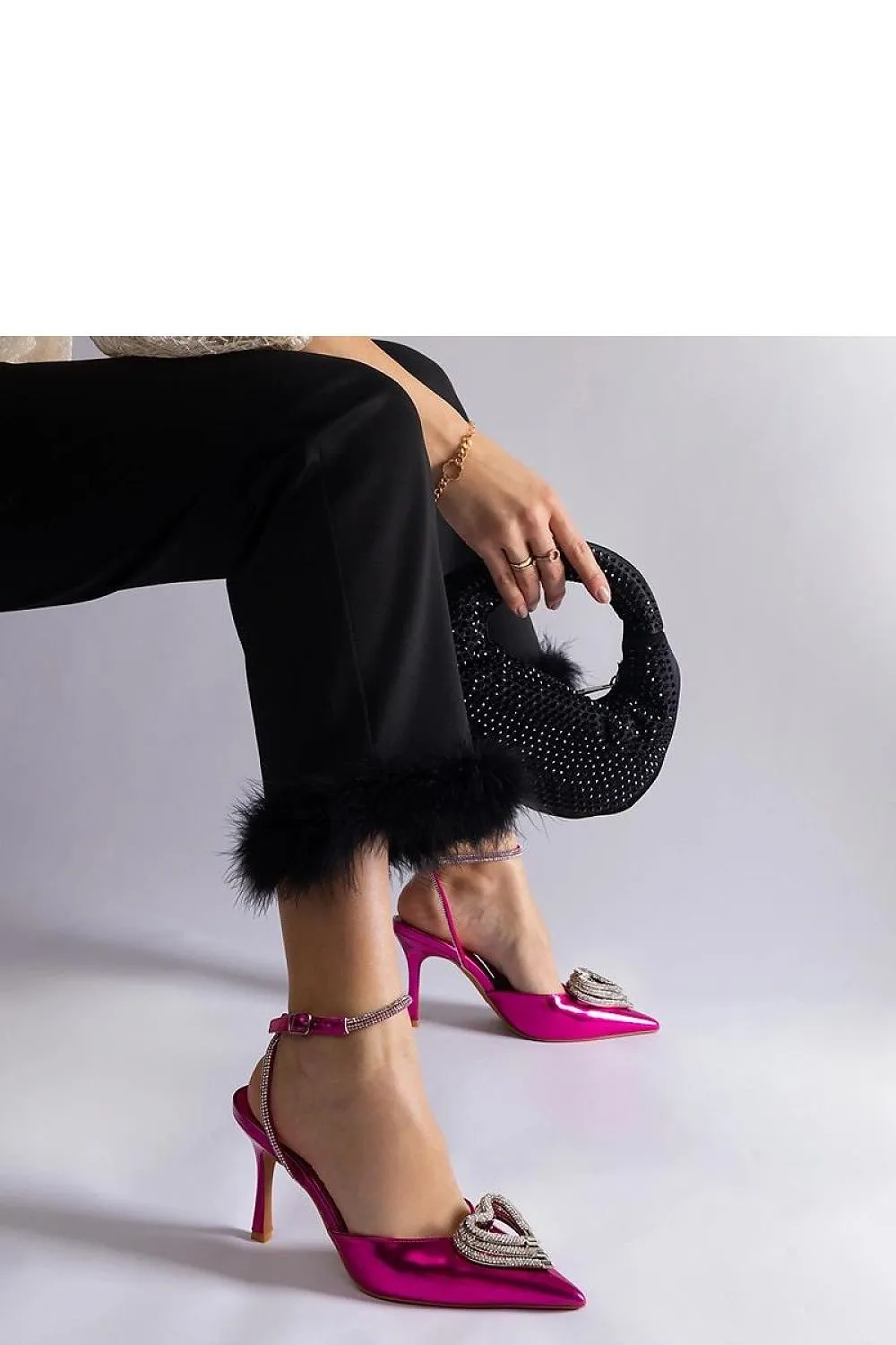 Black high heels with an open heel