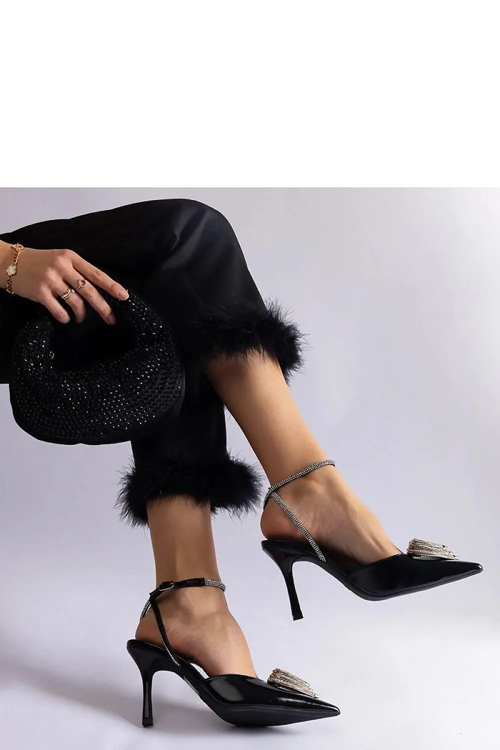 Black high heels with an open heel