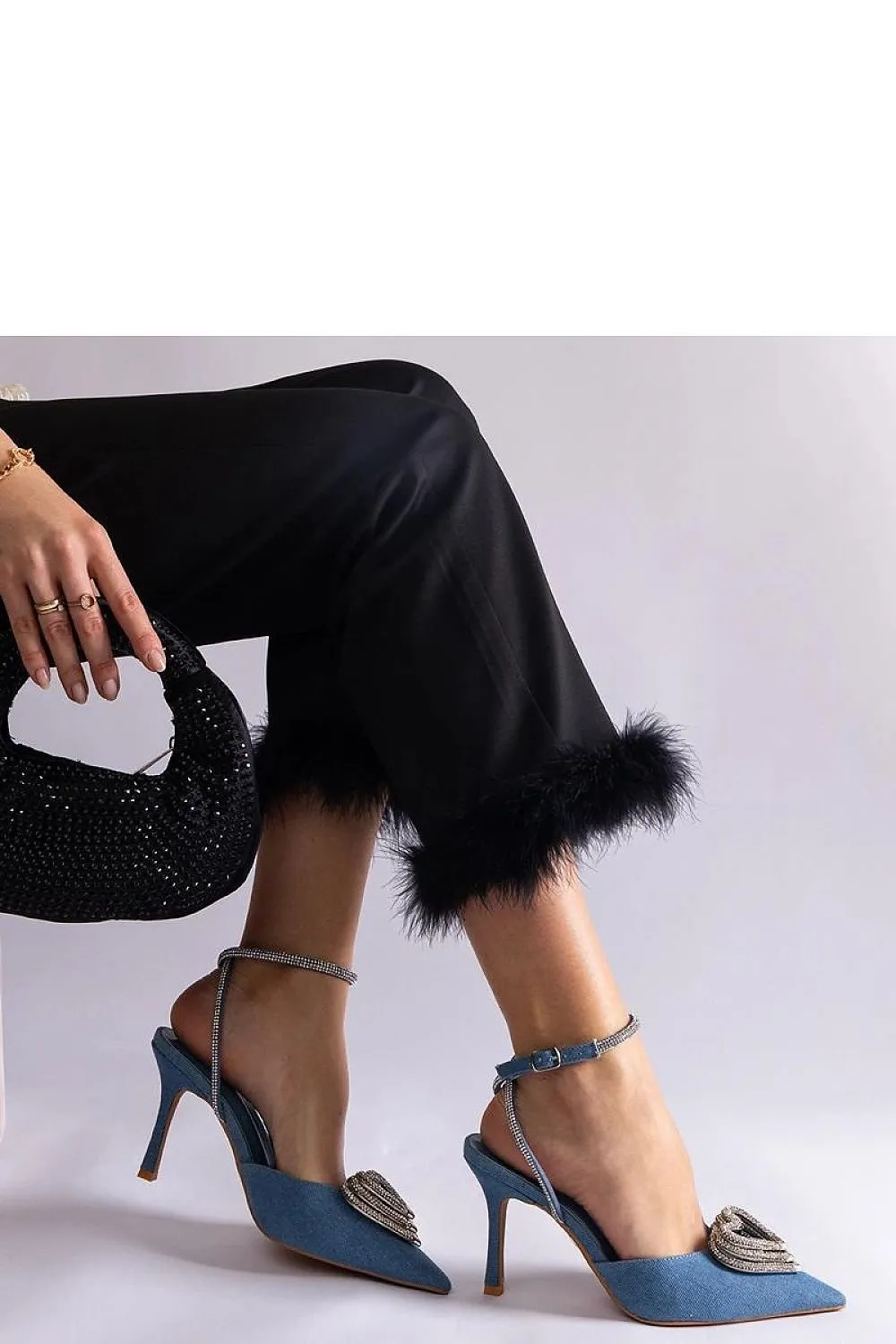Black high heels with an open heel