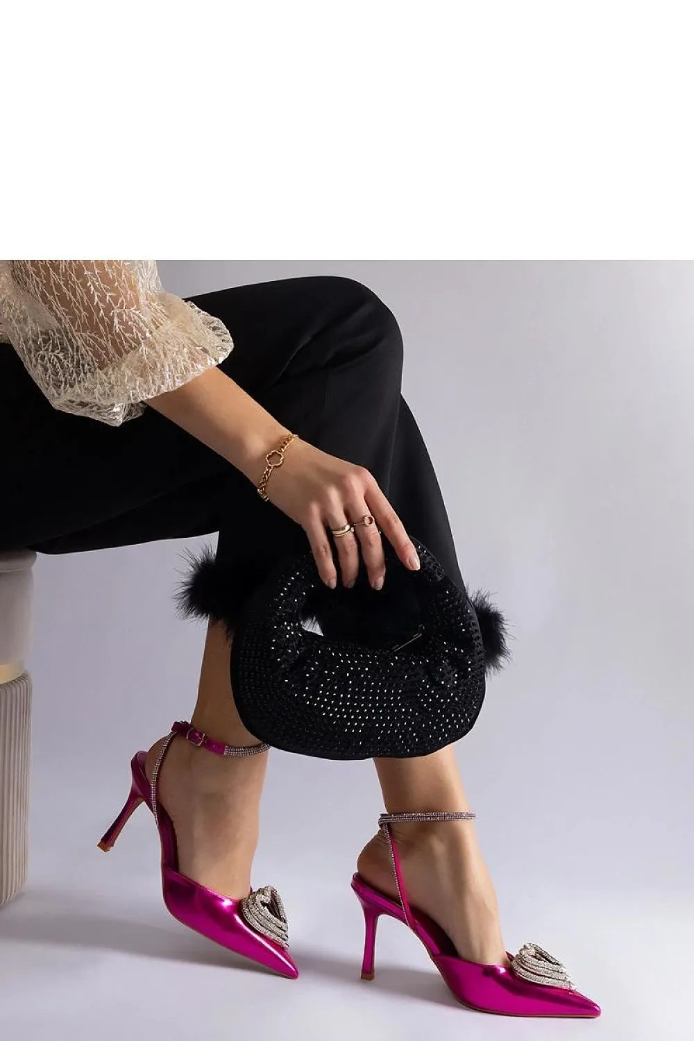 Black high heels with an open heel