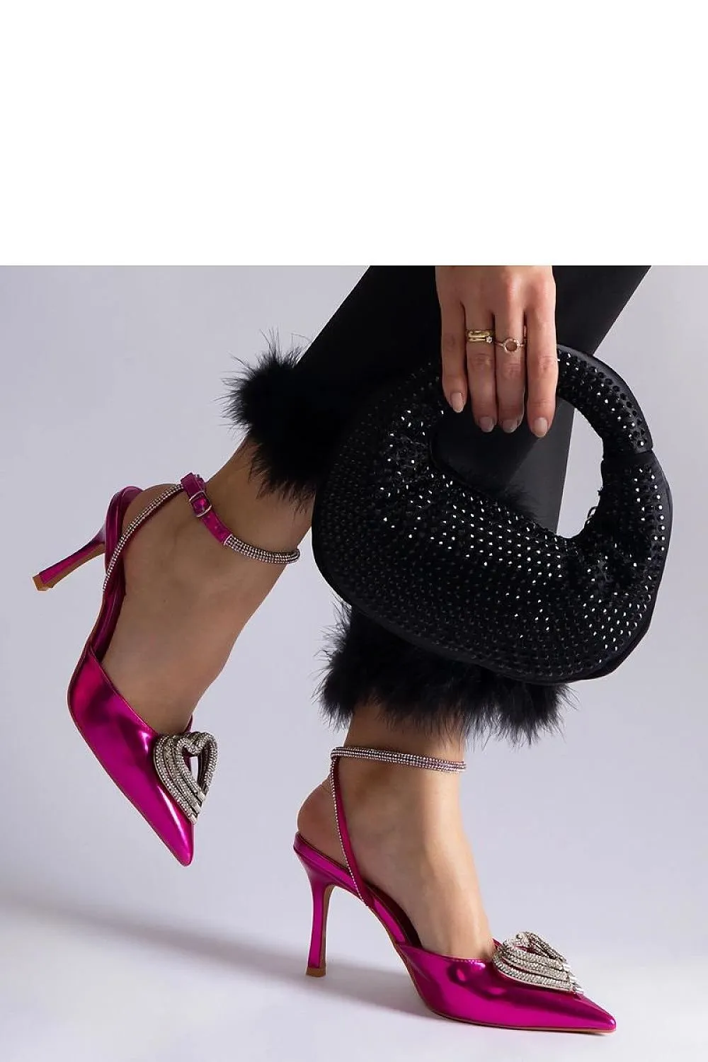 Black high heels with an open heel