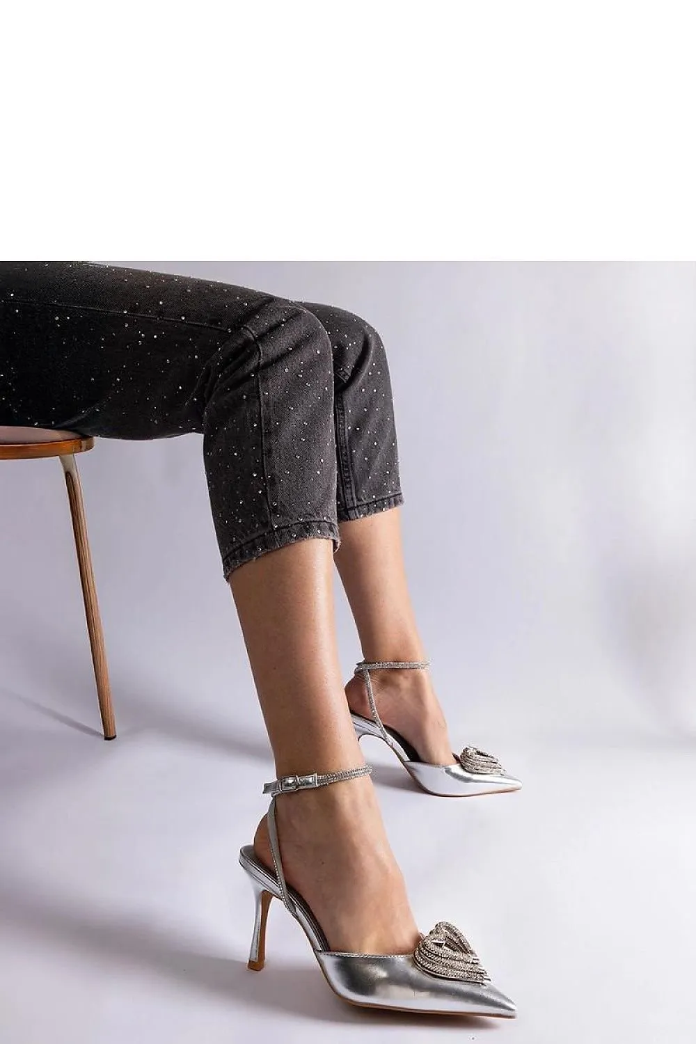 Black high heels with an open heel