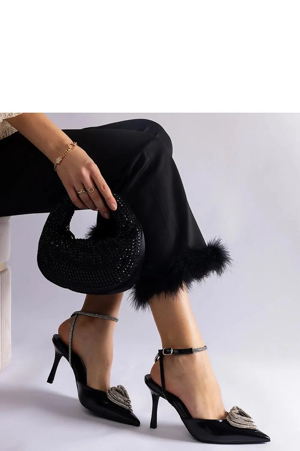 Black high heels with an open heel