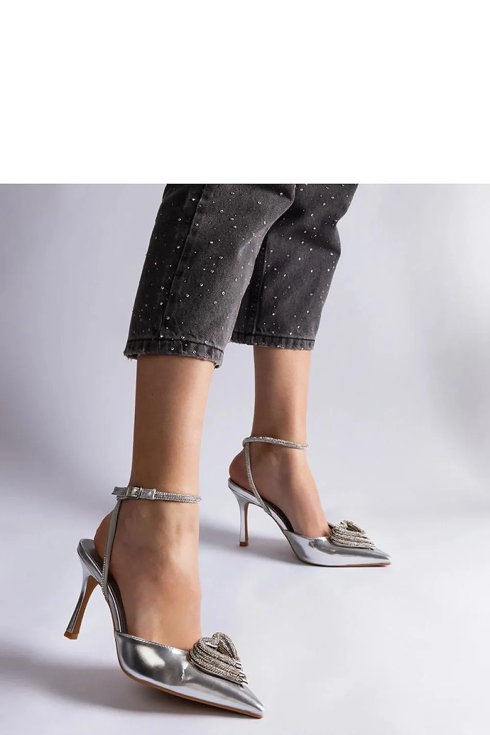 Black high heels with an open heel