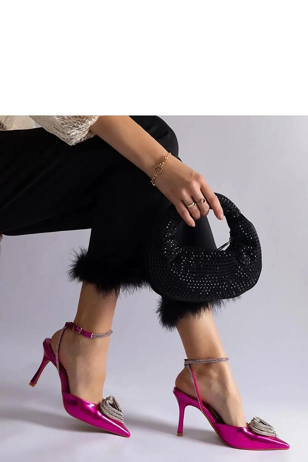 Black high heels with an open heel