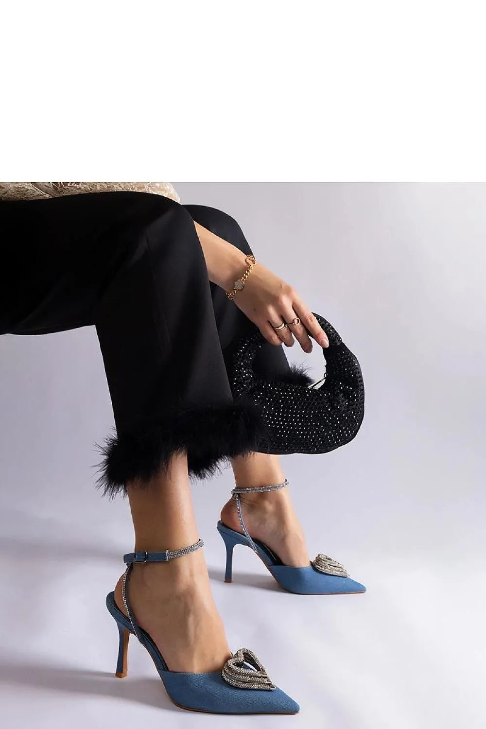 Black high heels with an open heel