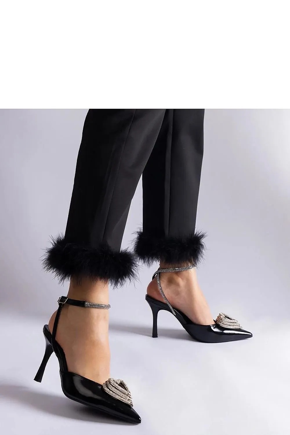 Black high heels with an open heel