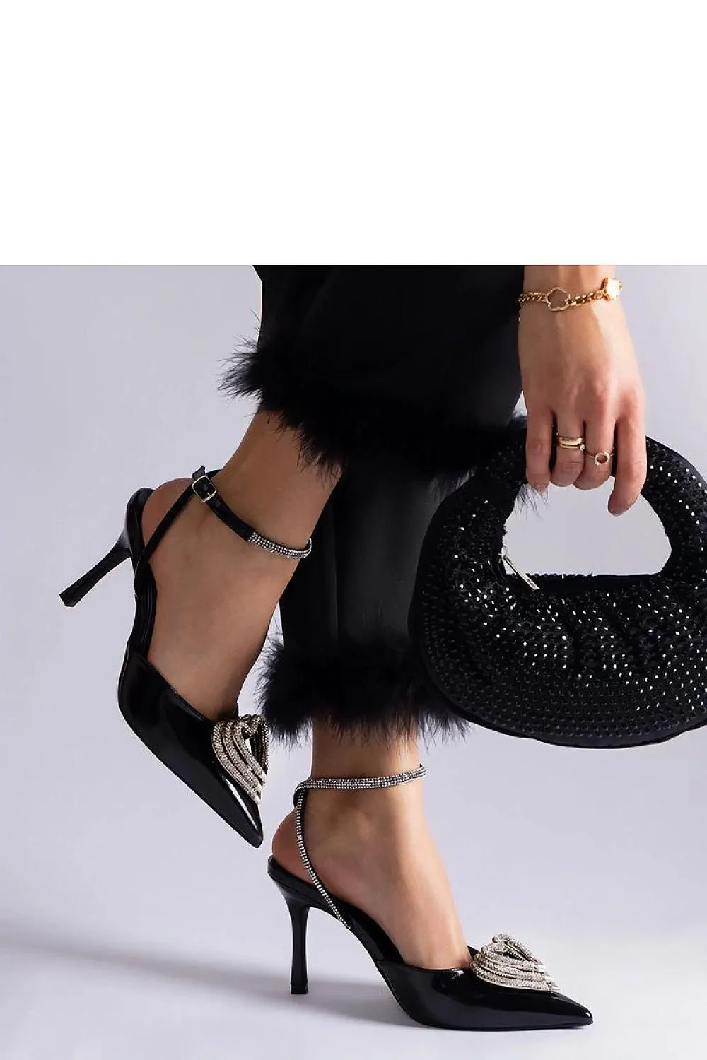 Black high heels with an open heel