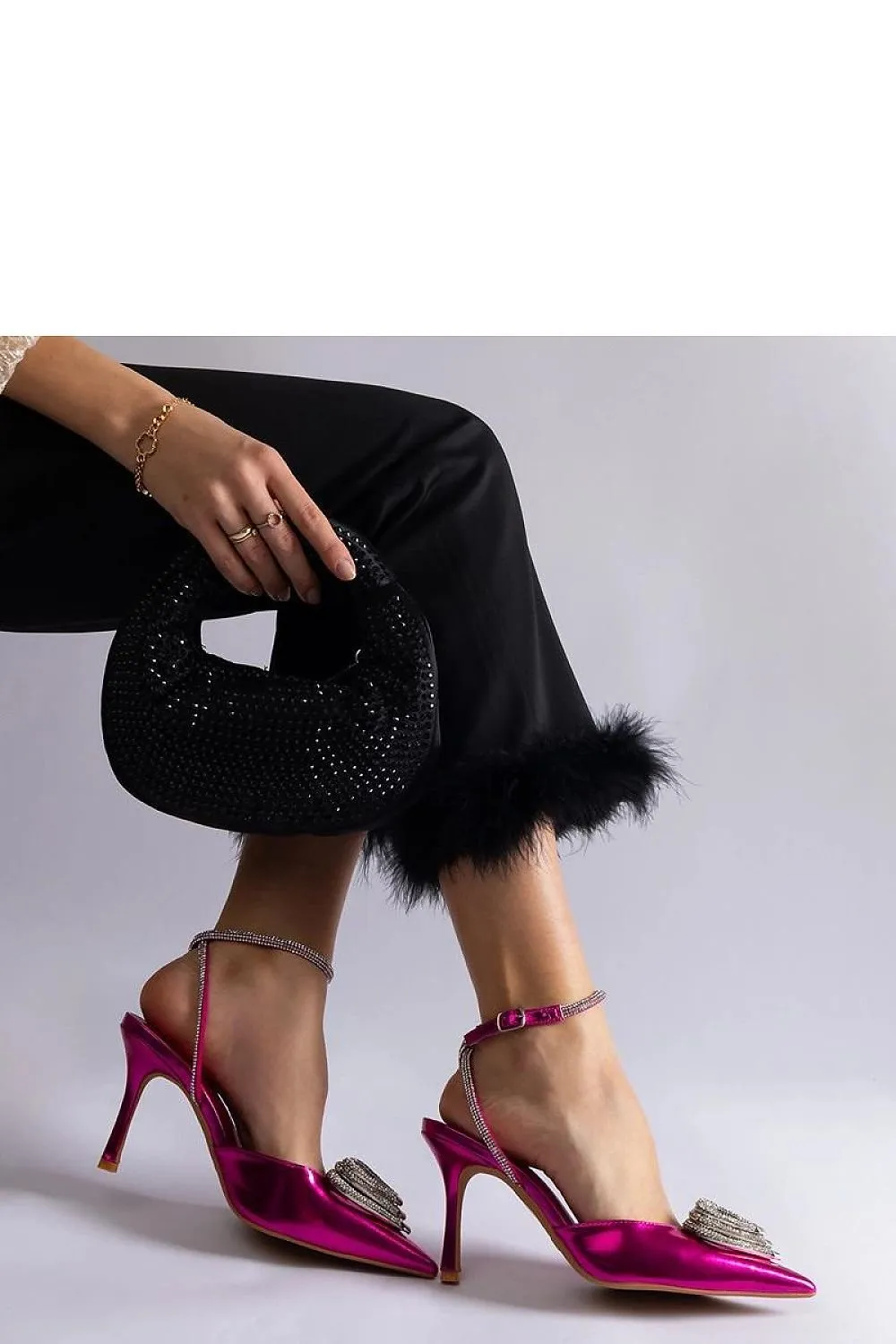 Black high heels with an open heel